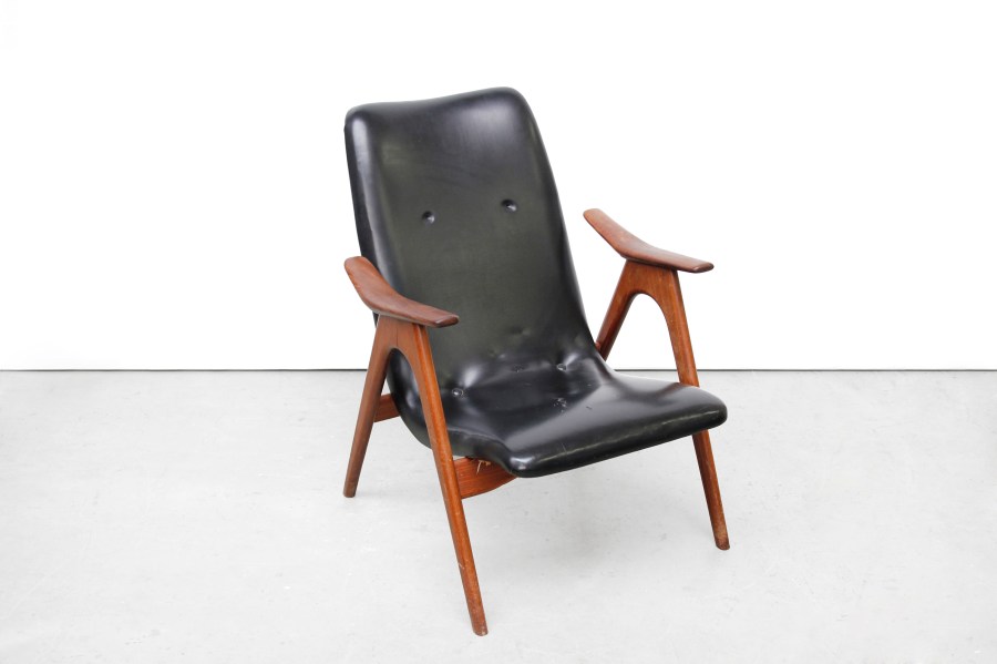 Restauratie zwarte design fauteuil before