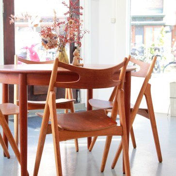 Hans J Wegner Sawbuck model CH29 vintage chairs stoelen by Carl Hansen in the VAN ONS shop in Amsterdam FOR SALE